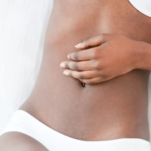Tummy Tuck - Woman in white underwear