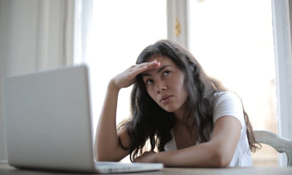 stressed woman at laptop