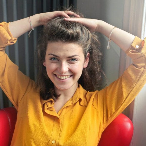 woman in red chair